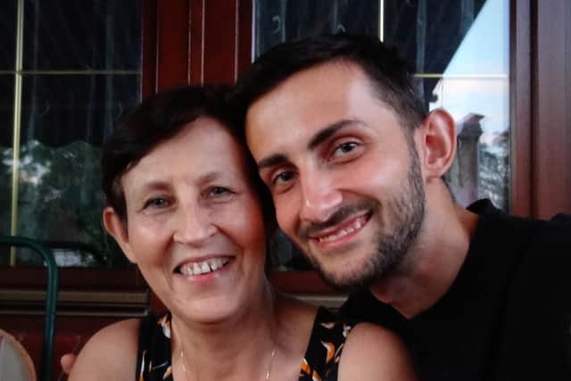 Kamil Pawlowski with his mother.