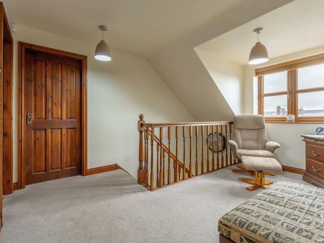 With its pleasant seating area and space for a mini-office, the good-sized landing is almost a room in its own right.