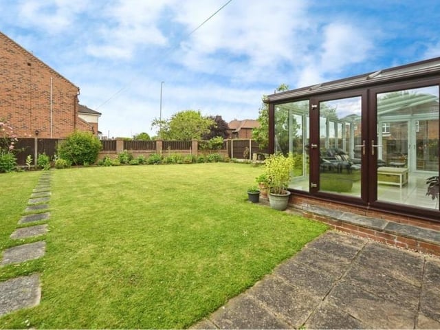 Whether you want to host gatherings, soak up the sun or cultivate a personal garden, the outdoor space at the back offers endless options.