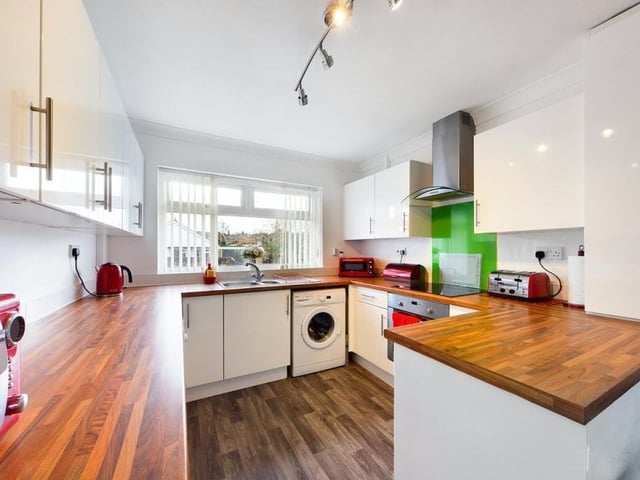 For a two-bedroom bungalow, the kitchen boasts plenty of space. Not even a masterchef could complain.