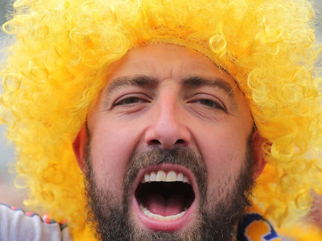 Mansfield Town fans soak up the Wembley atmosphere.