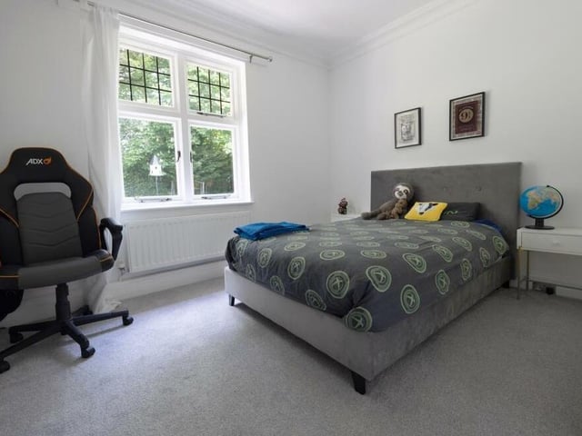 The fourth of the bedrooms on the first floor of the Norfolk Drive property. It is a generous size, facing the back of the house, and has access to an en suite.