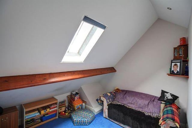 Four of the property's five bedrooms are located upstairs and feature Velux windows.