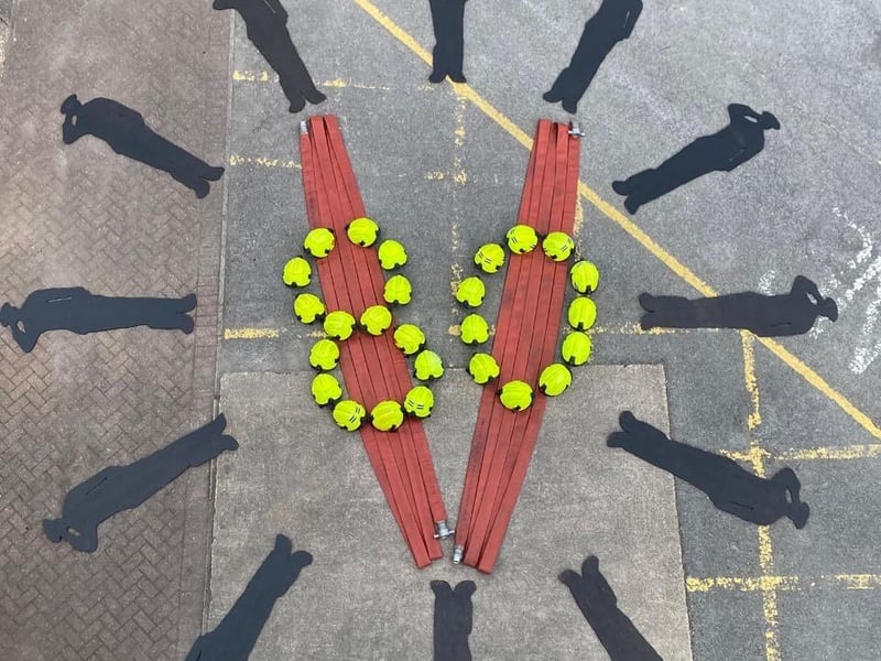 Ashfield Fire Station commemorated this significant day with heartfelt drill art, featuring silhouettes from ATTFE College.