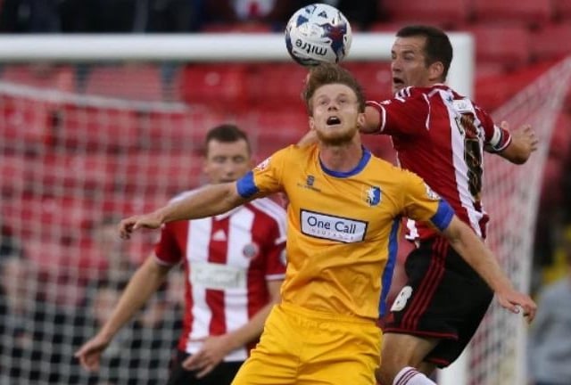 Scorer Fisher joined Stags after spells in Belgium and Italy and went on to feature for several clubs in England and Scotland, and is currently with Bath City.