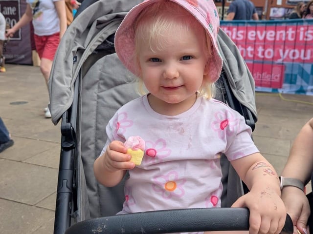 All smiles for this youngster after getting a yummy treat from the event.