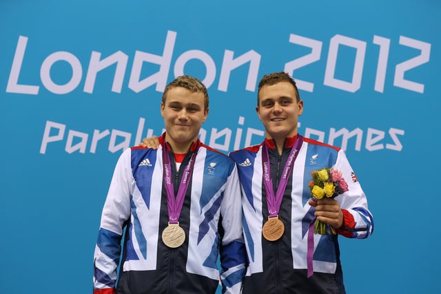 Silver medallist Oliver Hynd and brother Sam, bronze medallist, pose on the podium during the medal ceremony for the Men's 400m Freestyle of the London 2012 Paralympic Games. It was yet another milestone for the brothers who won multiple gold medals between them during two memorable careers.