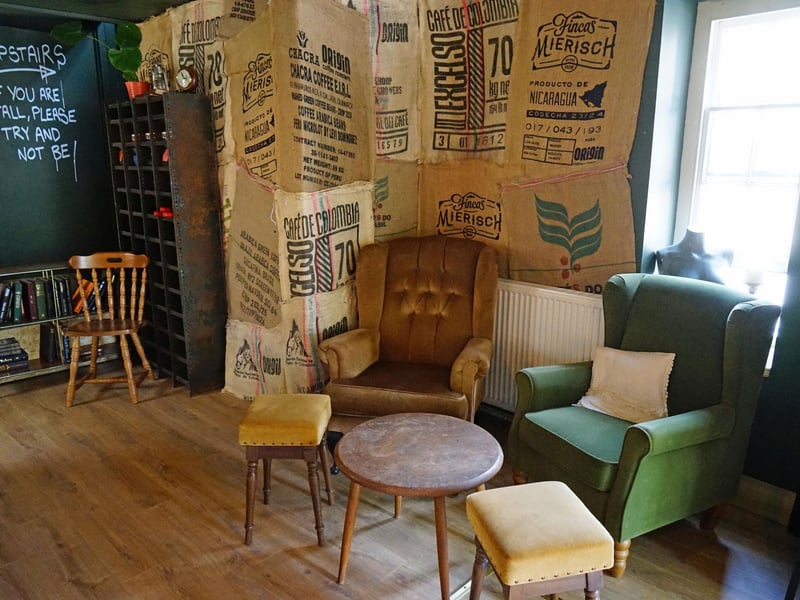 Empty coffee sacks adorn a corner of the ground floor.