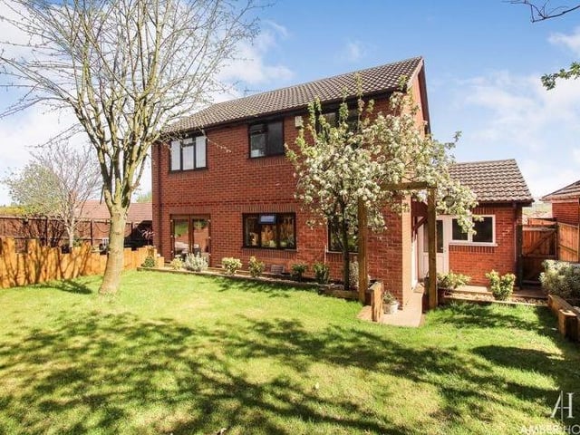 This is the view from the rear of the £320,000 South Normanton property. Spot the double patio doors that lead from the living room/diner.
