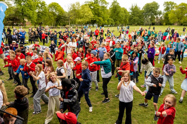 Around 450 primary school children joined the event for school activities and wartime song and dance.