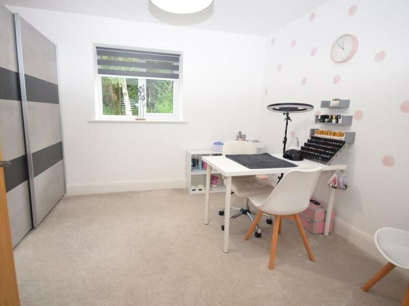 The fifth and final bedroom could be put to multiple uses. Maybe a home office, maybe a study or maybe a workspace.