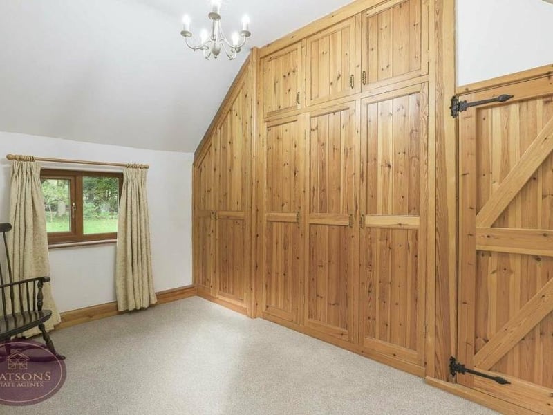 No worries about wardrobe space in this sizeable bedroom on the first floor of the £700,000-plus Bagthorpe property.