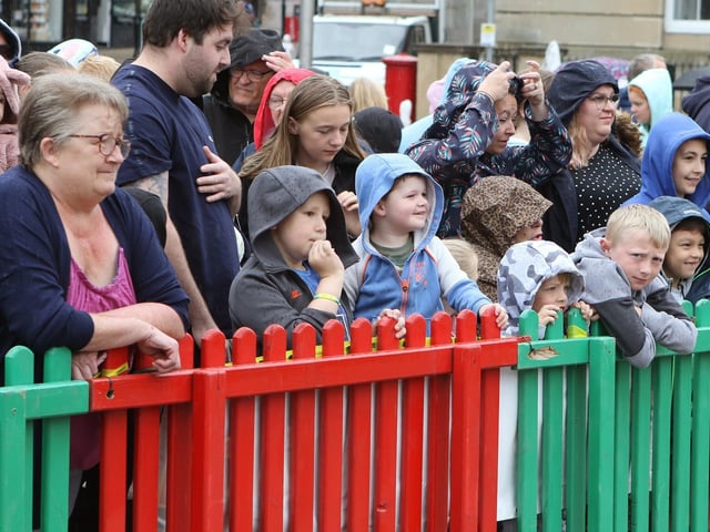 Dinosaur day attracted hundreds of families, despite the rain.