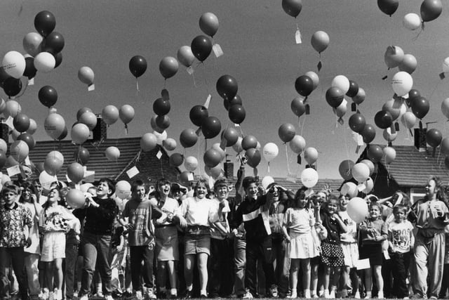 Hundreds of balloons released from Harton Junior School in May 1990. Can you spot someone you know?