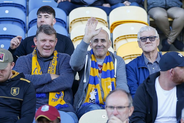 Stags fans watch the Papa John's Trophy match against Manchester City FC (U21) at the One Call Stadium.