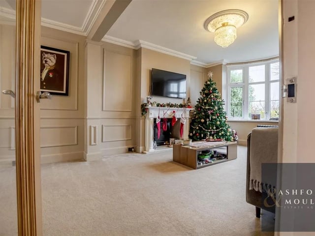 The property is immaculate with stunning character features including bay windows, paneling and statement fireplaces.