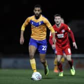 CJ Hamilton runs with the ball during the Sky Bet League Two match between Leyton Orient and Mansfield Town at The Breyer Group Stadium on February 11. (Photo by Naomi Baker/Getty Images)