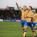 Mansfield Town forward Will Evans (11) celebrates his second half goal with Rhys Oates (18), during the Sky Bet League 1 match against Port Vale FC  at the One Call Stadium, 17 Jan 2026, Photo credit Chris & Jeanette Holloway / The Bigger Picture.media