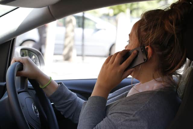 Nottinghamshire has seen an increase in people being charged with using a mobile phone while driving.  PICTURE POSED BY MODEL. Photo: Other