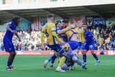 Action during the Sky Bet League 2 match against AFC Wimbledon at Cherry Red Records Stadium, 13 December 2025 Photo Chris Holloway / The Bigger Picture.media