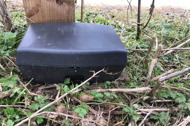 One of the bait boxes near the path