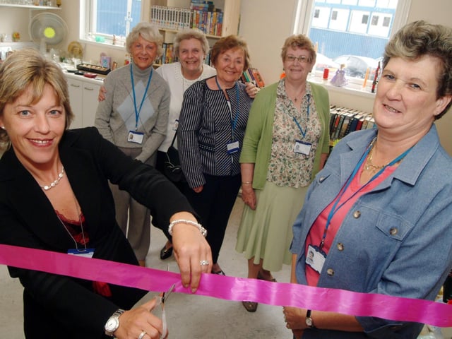 King's Mill Hospital volunteers relaunched the Charity Shop in 2008. Trust chairman Tracy Doucet, left, cut the ribbon with Charity Shop co-ordinator Eve Booker, right, watched by Charity Shop volunteers, from the left; Marjorie Grice, Mary Abell co-ordinator, Sheila Whalley and Barbara Lewis.