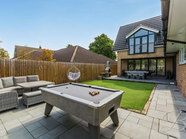There's even space for an al fresco pool table in the rear garden, which is suitably fenced to guarantee privacy.
