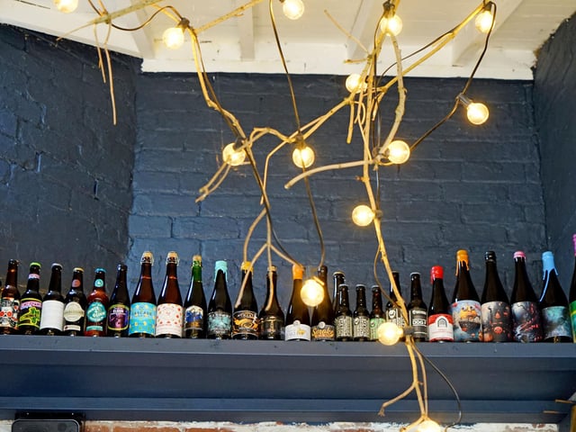 Assortment of alcoholic beverages to attract customers.