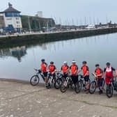 All ready for the off! The cyclists on the Cumbrian coast on day one of their 141-mile, three-day marathon to raise thousands of pounds for a cancer charity.