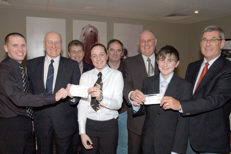 Stanton Hill Boys Brigade reveived cheques totaling £1,600 from Sutton S.O.S. and Sutton Freemasons at the Dakota Hotel, Annesley in 2008 to enable them to run the Duke of Endinburch Gold Award Scheme.  Handing the money over were Harry Lingard, second right, of Sutton S.O.S., John Howis, third right, of Sutton S.O.S. and Sutton Freemasons and John Taylor, right, of Sutton Fremasons. Receiving the money are from the left; Jim Wakeland, Paul Halfpenny, Nic Jenner, Doug Pritchard and Alex Davies.