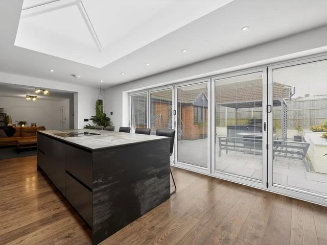 Moving from the kitchen/dining area the expansive bi-fold doors open out to the external space which is equally impressive - perfect for alfresco dining