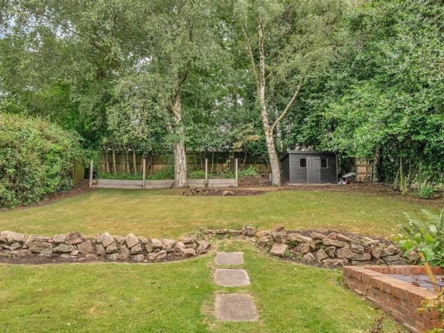 Impressive mature trees ensure the garden is private and enclosed.