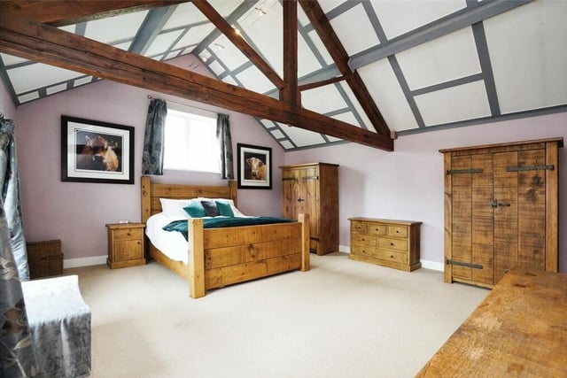 And so to the first floor of the £525,000 Brinsley barn conversion. The highlight is this beautiful master bedroom with its amazing vaulted ceiling.