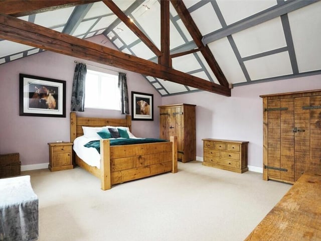 And so to the first floor of the £525,000 Brinsley barn conversion. The highlight is this beautiful master bedroom with its amazing vaulted ceiling.