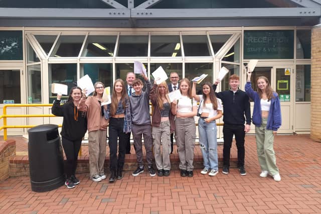Chloe Edwards, Isabelle Bray, Maddie Brown, Harry Turner, Amelia Brown, Stephanie Kocun, Neave Musgrove, Oscar Tunnicliffe, Alice Foros, Martin Fiddimore, director of Post 16 and Carl Atkin, principal
