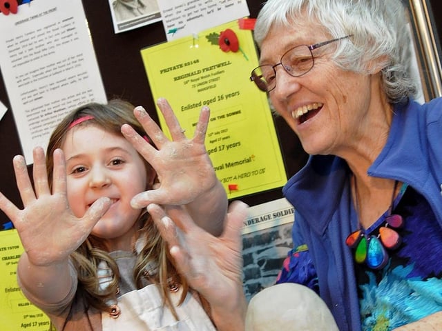 Mud heads challenge Mansfield Museum. Team Childsplay saw Leah Childs, 5, and Grandma Ann Childs from Mansfield, work their clay into each other's likeness in 2017