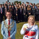 Pupils at All Saints Catholic Academy greet Mansfield's Paralympic star Charlotte Henshaw and Mayor, Andy Abrahams, during an event at the school last September.