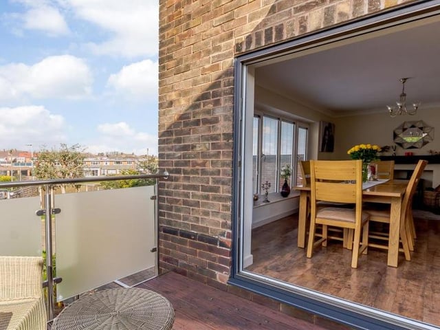 How the dining room opens out on to the balcony. It is clearly a special feature of the house.