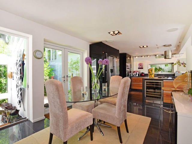 The dining area looks onto the back garden.