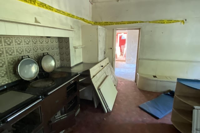 The kitchen was bare and lifeless before the building's makeover.