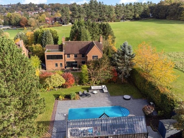 The last photo in our gallery is a brilliant aerial shot of the Appledore plot, which extends to almost half an acre and offers enclosed peace and privacy in a lovely setting