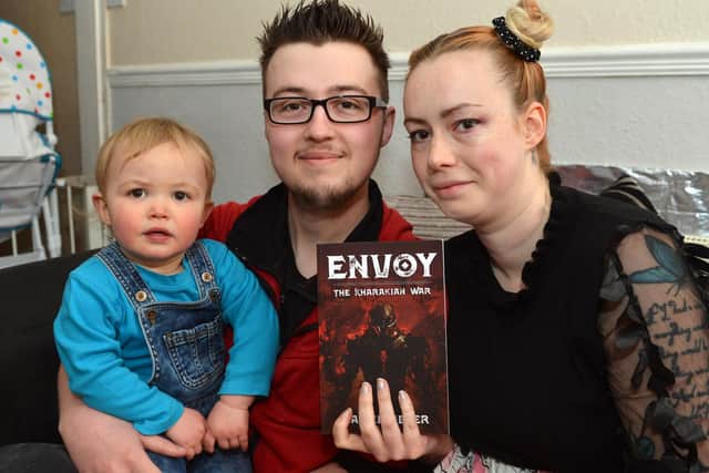 Sutton author Daniel Adler with his wife Hollie and their son, Gabriel.