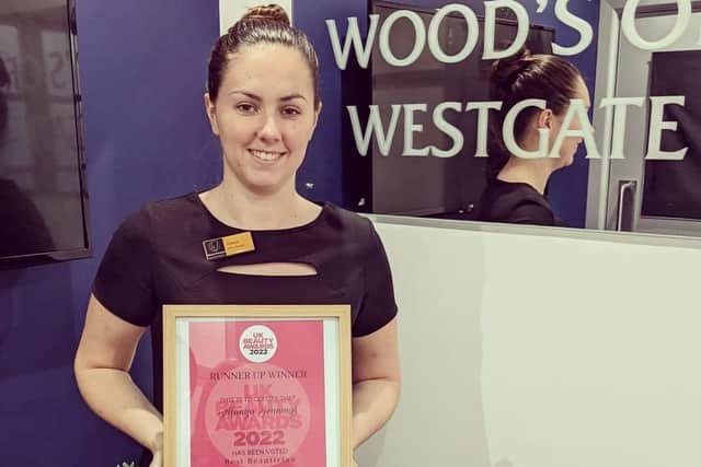 Alanya Jennings, manager of the Wood's Of Westgate salon in Mansfield town centre, with her award.