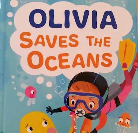 One of Olivia's books about plastic waste in the ocean, which helped encouraged her to care abou tthe environment.