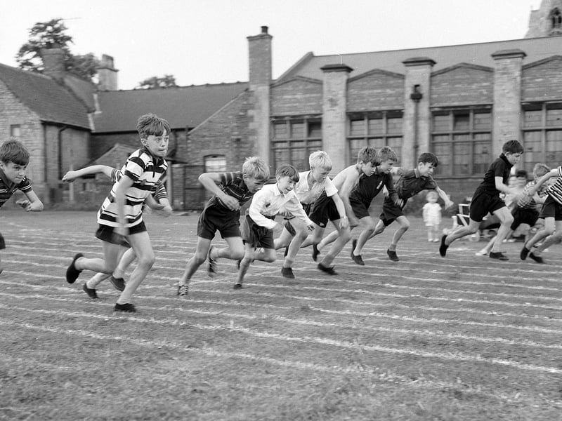 Pupils race in a beautiful backdrop during a school sports day at Mansfield Woodhouse's St Edmunds School in 1965.