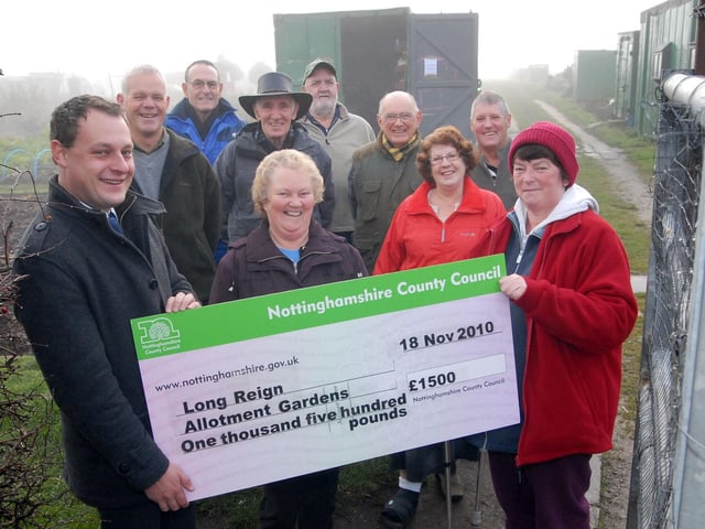 Coun. Jason Zadrozny hands over a £1,500 cheque to Teena Needham, secretary of Long Reign Allotment Gardens in Skegby for the purchase of new gates on their Mansfield Road and New Lane entrances. 2010.