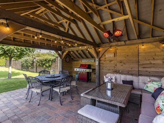 A major highlight of the rear garden is this superb wooden gazebo, which offers not only shelter from the sun or rain but is also a delightful al fresco living space.