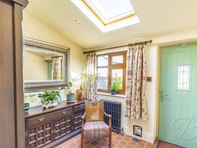 This quaint study is a versatile space, offering plenty of potential to be used to your advantage. The window overlooks the back of the bungalow.