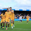 Nathan Moriah-Welsh celebrates his 1st half goal with Jon Russell and Michael Smith during the Sky Bet League 1 match against Luton Town FC at the One Call Stadium, 30 Aug 2026, Photo credit Chris & Jeanette Holloway / The Bigger Picture.media