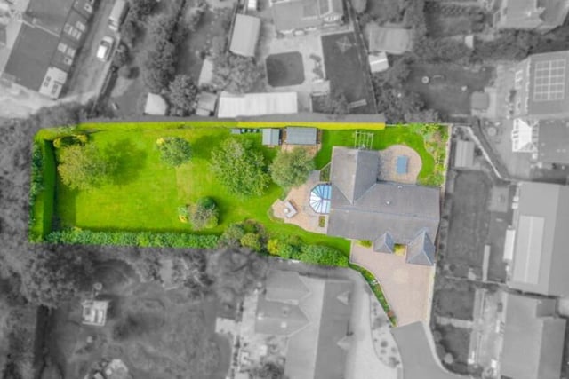 This last drone shot shows two outbuildings within the garden. There is a shed for storage and also a wooden workshop or studio that has light and power and would be perfect as a garden office or for some DIY tinkering.